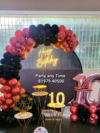 Another option for a 10th birthday, this one uses rose gold foil balloons for the number '10'.
