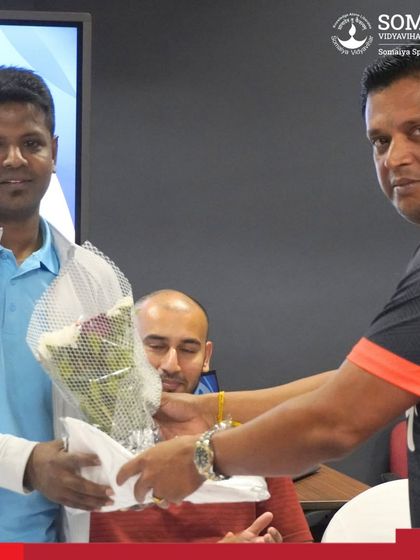 A moment of appreciation during our swimming coaches clinic. We ensure our guest speakers and participants feel valued, fostering a collaborative atmosphere for professional growth and networking.