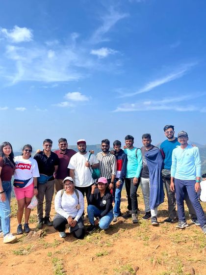 A group photo on a sunny day on the trails.