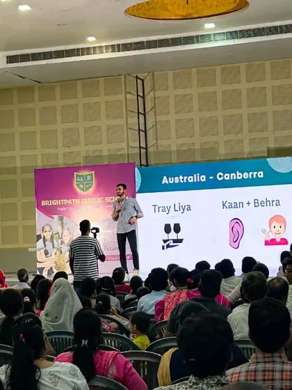 Here you can see one of our unique memory techniques in action at a live seminar in Kishangarh. We use visual association, like connecting 'Australia' with 'Tray Liya' and 'Canberra' with 'Kaan+Behra', to make information stick. This is how we make learning fun and unforgettable.