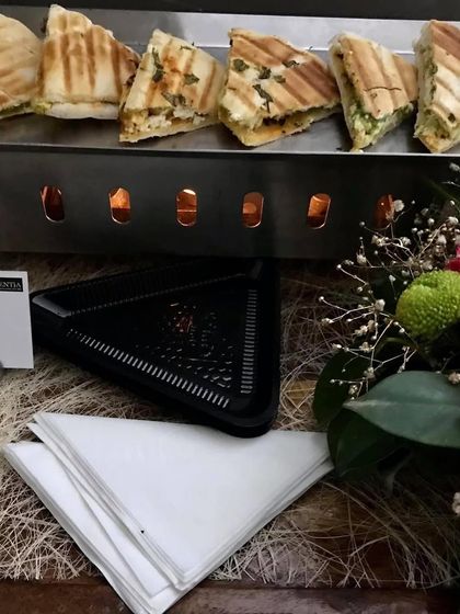 Hot and fresh paneer sandwiches being served at a Lohri gathering. A simple yet delicious option that is always a hit with guests of all ages.