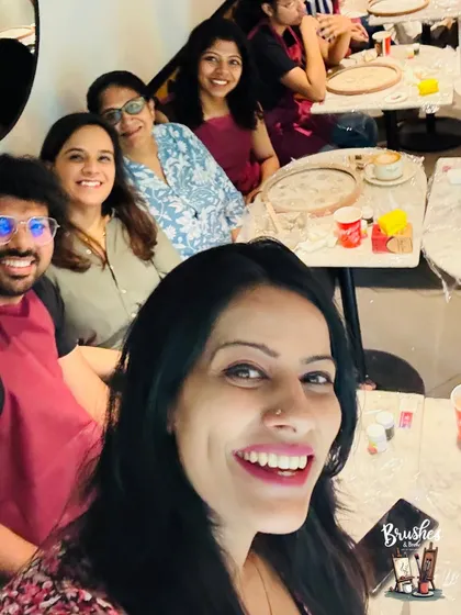 A selfie to capture the moment. Friends and family enjoying a creative get-together for Mother's Day, making it a celebration for everyone.