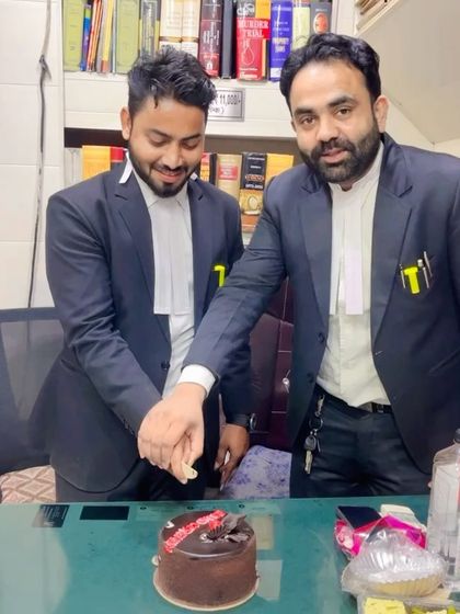 Cutting the cake during my band ceremony with my mentor.