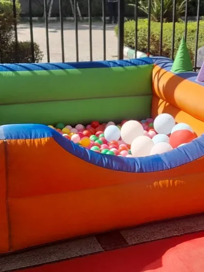 A side view of the square inflatable ball pool, showing its sturdy construction and ample space for several children to play together.