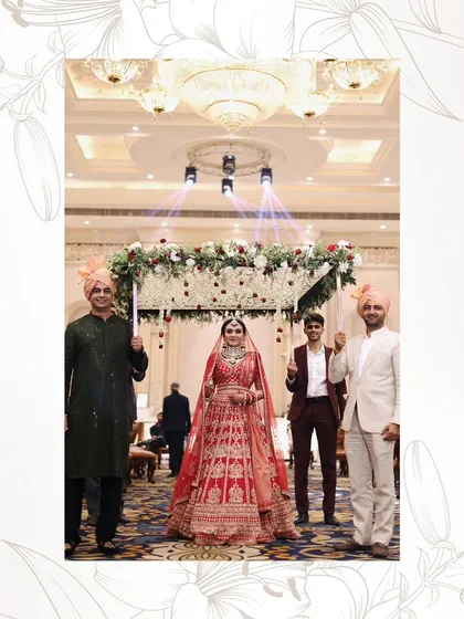 The bride's grand entry under a phoolon ki chadar. Her makeup is designed to make a statement from the moment she appears.