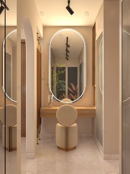 The walk-in dresser area connected to the master bedroom. It features a sleek vanity with an oval backlit mirror and continues the tropical theme with sandwich glass panel wardrobes.