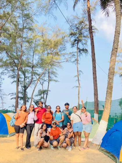 A group photo at our beachside tent camping site in Gokarna.