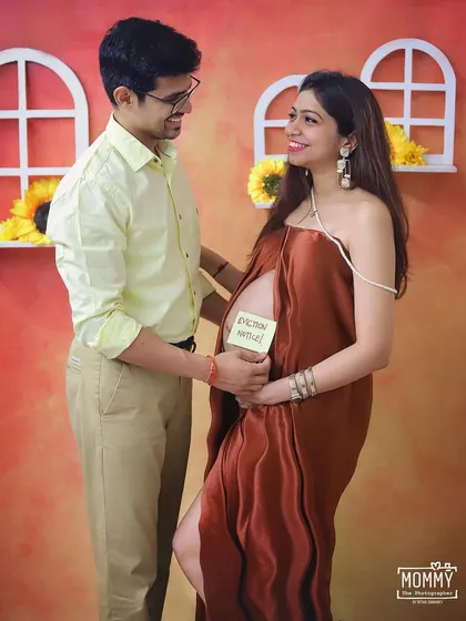 Time's up. This hilarious "Eviction Notice" sign is a fun prop that brings so much personality to a couple's maternity shoot. I love capturing these goofy, happy moments.