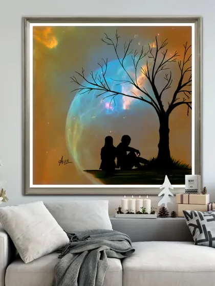 The couple silhouette with a large, magical planet in the background sky.
