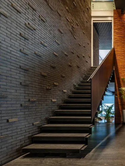The work lounge at BCG HQ showcases our use of simple, honest materials like brick and steel to create a sophisticated and durable interior environment.