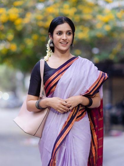 A smiling shot that radiates joy. This is how we want you to feel in our sarees: happy, confident, and beautiful.