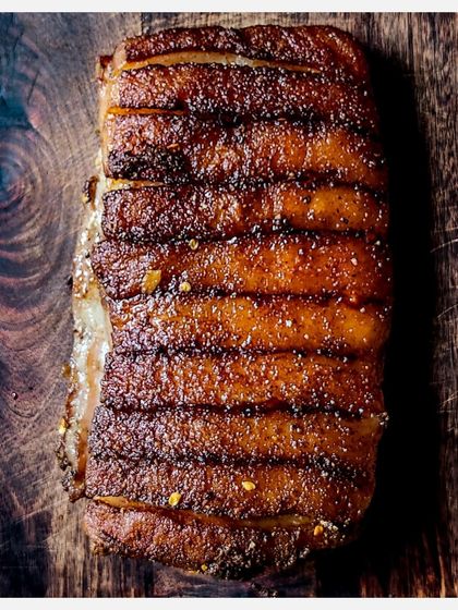 My signature Karnivore Ribs, perfectly grilled with a beautiful crust. These are marinated in a secret spice mix and slow-cooked to perfection.
