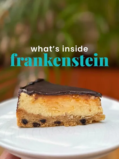 Here it is, all the layers of the Frankenstein in one perfect slice. You can see the chocolate chip cookie base, the cheesecake, the caramel, and the dark ganache.