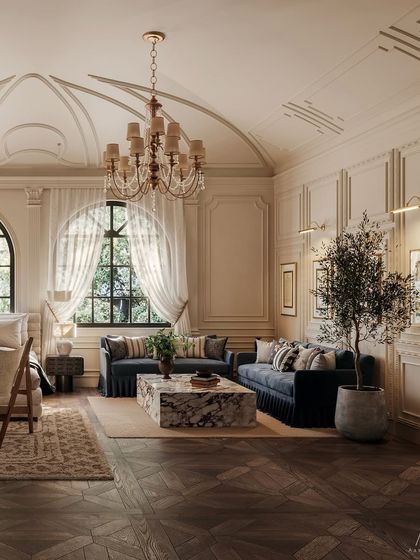 This angle of the master suite reveals a comfortable seating area with a deep blue sofa and marble coffee table. It demonstrates my approach to creating multi-functional bedrooms that serve as a private living space, not just a place to sleep.