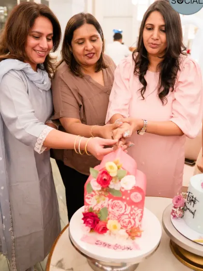 Another shot of the cake cutting at the "Phenomenal Women" event. Such a wonderful celebration of community.