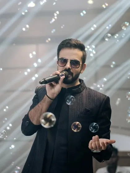 A magical shot with bubbles filling the air as I host the Sangeet. I love adding elements of surprise and delight to the event.