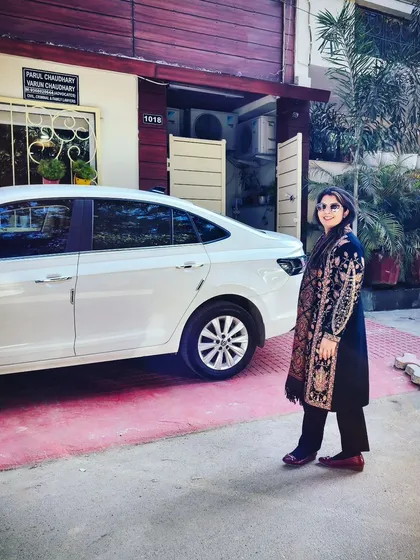 My partner Parul outside our Ghaziabad office. We established our firm to provide effective and reliable legal services to our community.