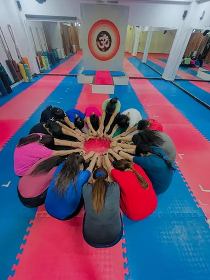In our classes, we are more than just individuals on a mat; we are a circle of support. This formation for Balasana, or Child's Pose, represents the unity and shared intention we bring to our practice.