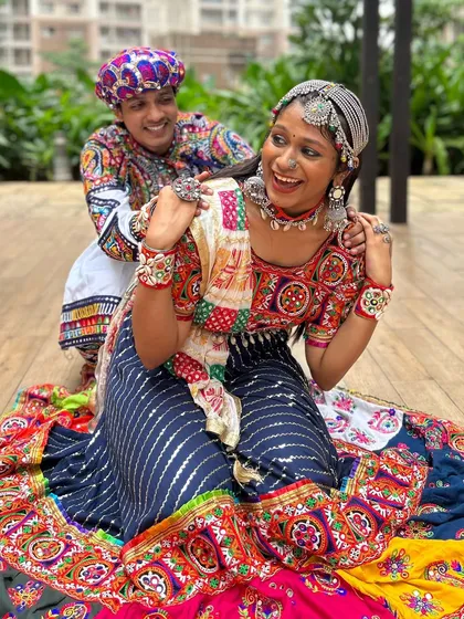 Fun and playful! This couple is having a great time showing off their coordinated outfits. My goal is to help you feel this happy and confident.