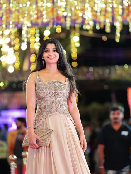 Actress Aishani Shetty looking elegant in a beautiful gown at the Chittara Star Awards.