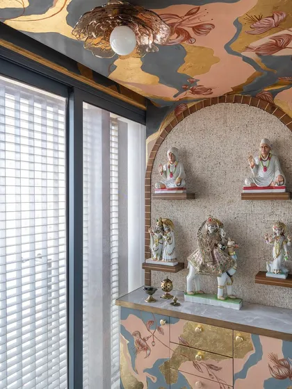 A mandir is more than a space; it's a sanctuary. For this home, I designed and painted a 'Fortune Shrine', creating a serene and sacred environment. The abstract patterns and hints of gold are meant to evoke a sense of peace and devotion, making the space truly divine.