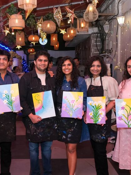 Another happy group from a private event, holding up their colorful floral paintings. My workshops are perfect for get-togethers of any size.