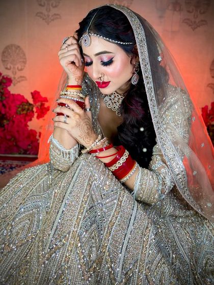 A serene moment. The soft pink eyeshadow and the flawless base create a very dreamy and ethereal look.