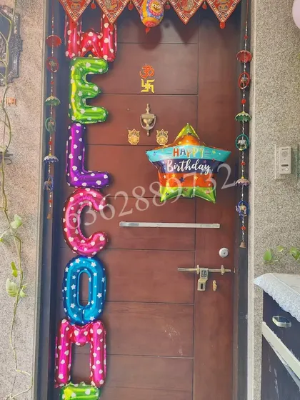 Greet your birthday guests right from the front door. This fun and colorful 'WELCOME' foil balloon arrangement, paired with a 'Happy Birthday' star, sets a festive tone before the party even begins.
