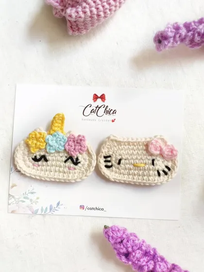 A closer look at our trendy Hello Kitty and unicorn crochet clips. These are inspired by Korean fashion and are very popular.