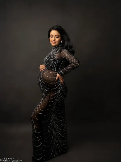 This sheer, embellished gown is for the mama who wants a truly glamorous and dramatic studio maternity shoot. It’s a statement piece that photographs like a dream.