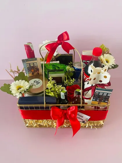 Another view of the celebration hamper, perfect for a birthday or anniversary. The red ribbons add a festive touch.