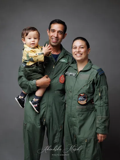 A duplicate of the classic Airforce family portrait, this image stands as a proud and loving testament to this family's bond.