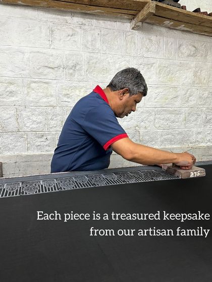 A treasured keepsake in the making. Our artisan works on a piece for our Festive Edit, using archival vintage motifs to create a textile that is both timeless and contemporary.