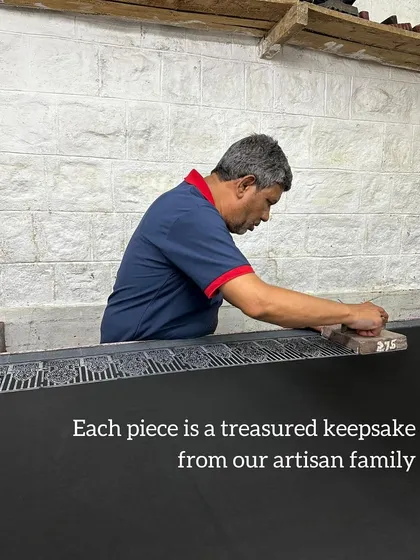 A treasured keepsake in the making. Our artisan works on a piece for our Festive Edit, using archival vintage motifs to create a textile that is both timeless and contemporary.