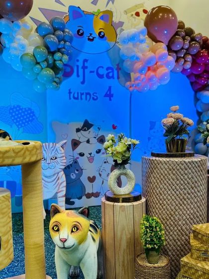 A purr-fectly delightful cat-themed party for a 4th birthday. We created a cozy and fun atmosphere with cat trees, character cutouts, and a custom backdrop.