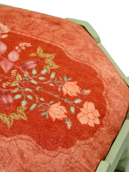 The beauty is in the details. This is a close-up of the custom fabric I designed for the priest seating at the Grah Shanti Puja. The intricate floral motifs in rust and peach tones were chosen to complement the serene, traditional atmosphere of the ceremony.