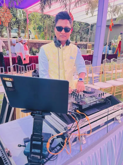 At the console during a daytime wedding carnival. These events are all about fun and games, and the music I play reflects that playful energy.