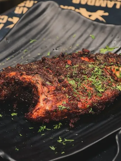 A beautifully prepared fried fish, seasoned with our special masala blend and garnished with fresh herbs. A great option for seafood lovers at our Iftar feast.