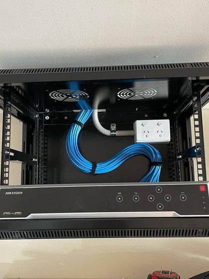 A full view of our professional rack-mounted Hikvision NVR setup. This organized system is perfect for businesses that require many cameras and easy maintenance.