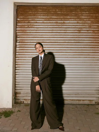 Power dressing is about confidence. For Jyotika's feature in The Hollywood Reporter, I designed this androgynous pinstripe suit with a strong shoulder and wide-leg trousers to create a look that is both dominant and effortlessly cool.