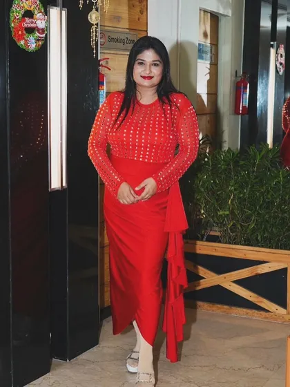 Dressed for success in a beautiful red outfit. My wardrobe is always ready for any event, anywhere.