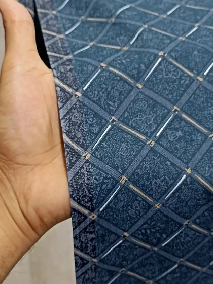 This is another one of my high-quality printed kurta fabrics. The intricate blue pattern is perfect for creating a comfortable and stylish garment for warm weather.