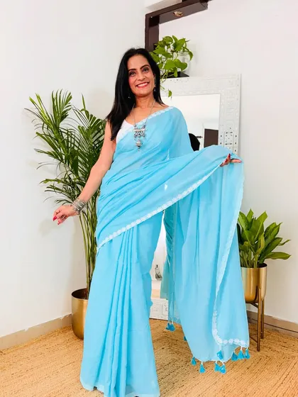 A beautiful sky blue Khadi cotton saree. The color is so soothing, and the lightweight fabric is perfect for a hot summer day.