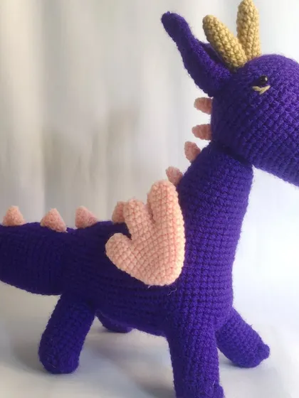 If you can dream it, I can crochet it. This custom purple dragon was a special request from a client, and I loved bringing this magical creature to life, stitch by stitch. I can create personalized amigurumi toys in your favorite colors and designs.