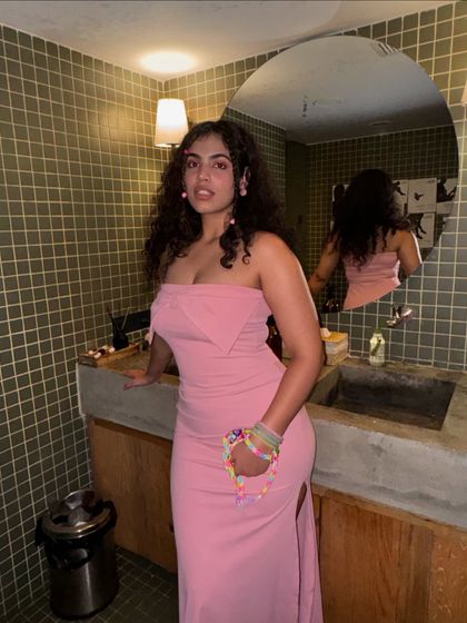 Another shot of the pink birthday dress. The strapless neckline and simple silhouette are so elegant.