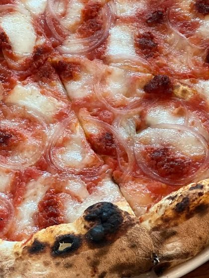 The crust on our Goan Sausage pizza is the perfect vessel for all that spicy goodness.