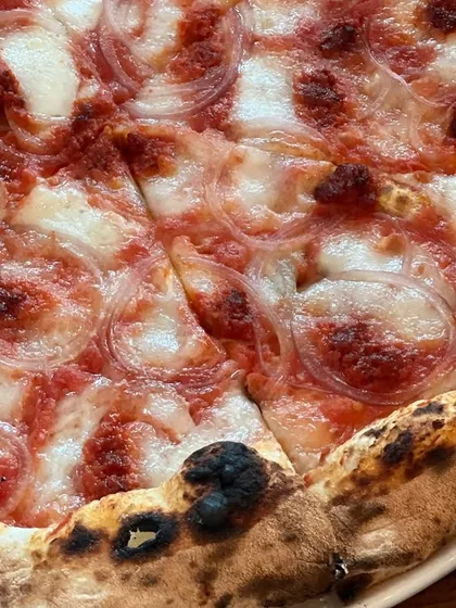 The crust on our Goan Sausage pizza is the perfect vessel for all that spicy goodness.