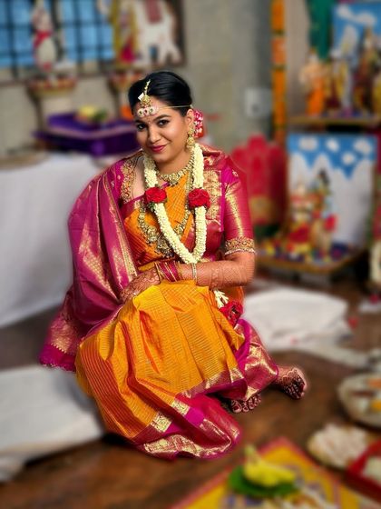 A beautiful shot of the bride seated for her Muhurtham ceremony. The makeup is designed to be long-lasting and picture-perfect through all the rituals.