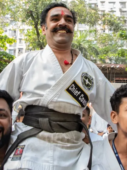 A moment of celebration with my students after a successful record attempt. Their support and the blessings of my gurus are my greatest strength.