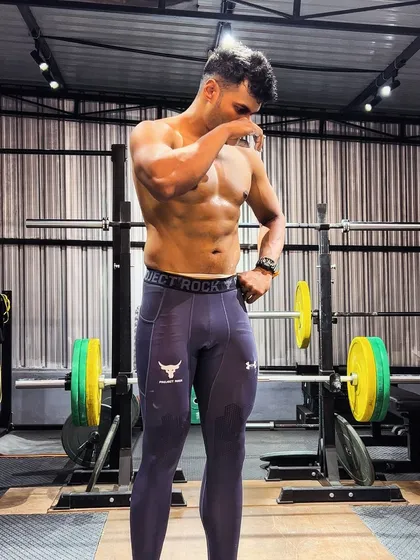 People think you can't have visible abs and be seriously strong at the same time. That's nonsense. I don't skimp on eating, but I train with an intensity that builds both performance and a powerful physique. You can have both.